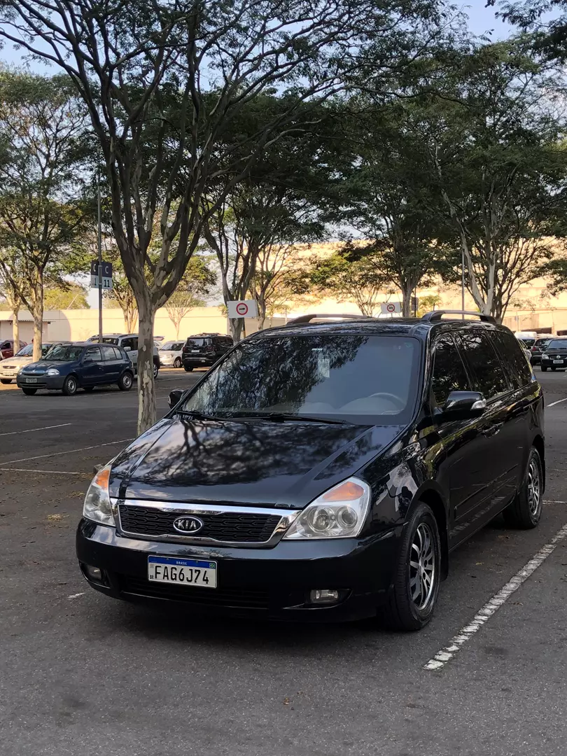 Kia Carnival 2012 Portas laterais automática